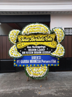 Papan Bunga Duka di Bandar Pulau