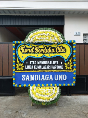 Papan Bunga Duka di Bandar Pulau